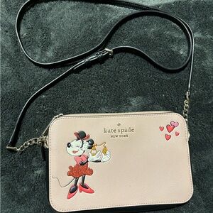 Kate Spade Cream and Black Crossbody Bag with Playful Design